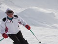 Woman is skiing at a ski resort Royalty Free Stock Photo