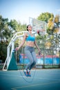 Woman skipping with a jump rope Royalty Free Stock Photo