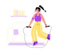 Woman with skipping rope doing fitness exercise at home Royalty Free Stock Photo