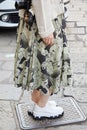 Woman with skirt with designs and black and white shoes before Peter Pilotto fashion show, Royalty Free Stock Photo