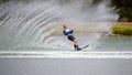 Woman Slalom Skier Bringing up a Large Water Plume Royalty Free Stock Photo