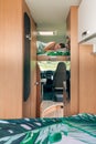 Woman sleeping alone on camper van bunk bed Royalty Free Stock Photo