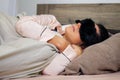 Woman sleeping in bed with eye mask Royalty Free Stock Photo