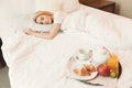Woman sleeping while the breakfast is ready Royalty Free Stock Photo