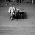 Woman sleeping in the bridge of arts in paris Royalty Free Stock Photo