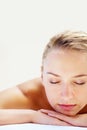 Woman, sleeping and closeup on bed in spa for health, wellness and recovery with rest, peace and quiet. Girl, mockup