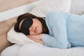 Woman Sleeping With Eyemask On Bed Royalty Free Stock Photo