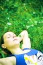 Woman sleeping on green grass Royalty Free Stock Photo