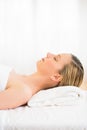 Woman Sleeping On Massage Table At Health Spa