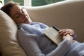 Woman sleeping peacefully on sofa Royalty Free Stock Photo