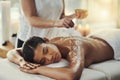 Woman, sleeping and relax in salt scrub massage at spa for skincare, exfoliation or body treatment. Calm female asleep Royalty Free Stock Photo