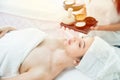 Woman sleeping at spa with aroma scent natural