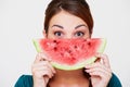 Woman with slice of watermelon