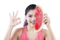 Woman with slice of watermelon on studio Royalty Free Stock Photo