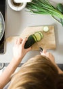 Woman slicing vegetables