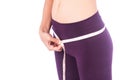 Woman with slim body measuring hips Royalty Free Stock Photo