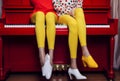 woman red modern trend elegant legs pianist colourful young piano fashion. Generative AI.