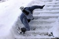 A woman slipped and fell on a wintry staircase Royalty Free Stock Photo