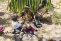 Woman with small children of the Hadzabe tribe Royalty Free Stock Photo