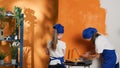 Woman with small girl doing housework improvement Royalty Free Stock Photo