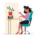 Woman in smart casual sitting at the desk and working on the computer