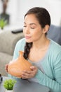 woman smelling bottle essential oil Royalty Free Stock Photo