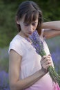 Woman smelling bouquet lavender