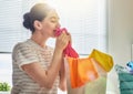 Woman is smelling clean clothes Royalty Free Stock Photo