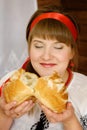 Woman smelling freshly made bread