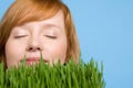 Woman smelling grass Royalty Free Stock Photo