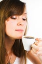 Woman smelling her cup of coffee Royalty Free Stock Photo