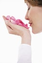 Woman Smelling Pink Rose Petals In Hand Royalty Free Stock Photo