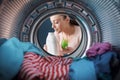 Woman smelling a scented laundry detergent Royalty Free Stock Photo