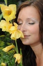 Woman smells the flower Royalty Free Stock Photo