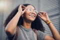 .Woman, smile and city travel of student with glasses on a street with vision of future dream. Urban, university holiday