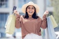 Woman, smile with credit card and shopping bag at mall with luxury, retail and excited for shop discount. Happy female