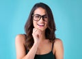 Woman, smile and portrait with glasses on blue background with trendy optometry vision. Fashion, happy and designer Royalty Free Stock Photo
