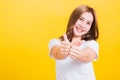 Woman smile wear white t-shirt successful woman giving two thumbs up gesture Royalty Free Stock Photo