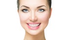 Woman smiling with ceramic braces on teeth