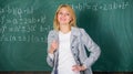 Woman smiling educator classroom chalkboard background. Working conditions which prospective teachers must consider Royalty Free Stock Photo