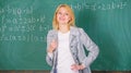 Woman smiling educator classroom chalkboard background. Working conditions which prospective teachers must consider Royalty Free Stock Photo