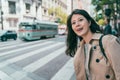Woman smiling and feeling curious while traveling Royalty Free Stock Photo