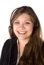 Woman smiling with headset Royalty Free Stock Photo