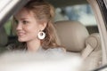 Woman smiling in her new car Royalty Free Stock Photo