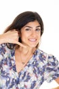 Woman smiling make phone sign gesture call me back with hand and fingers like talking on phone cell