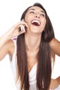 Woman smiling and speaking at her celular