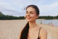 woman ocean sunset smile vacation summer beach long sea sand hair lifestyle Royalty Free Stock Photo