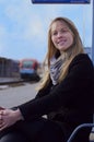 Woman smiling in train station