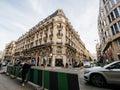 Woman smoking on a Paris street