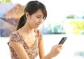 Woman sms on phone Royalty Free Stock Photo